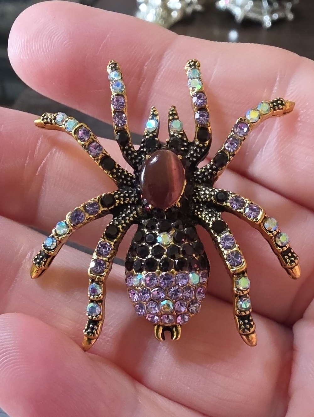 A140- Gold-Tone Purple Crystal Spider Brooch